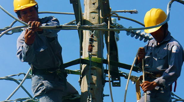 10261091-asian-electrician-climb-high-work-on-electric-pole