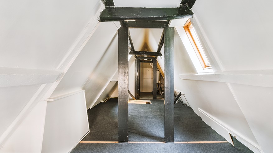 55152989-a-small-space-in-the-attic-of-a-residential-building