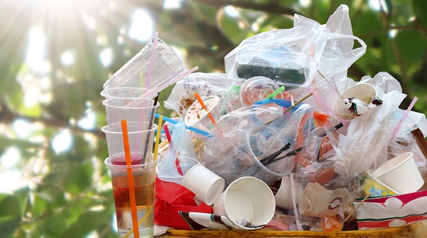 33982369-waste-plastic-heap-at-bin-trash-full-bin-waste-garbage